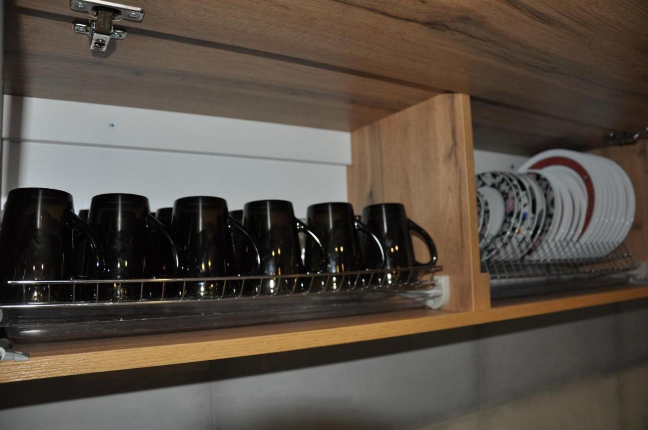 Full House Capsule Hostel Rivne Zewnętrze zdjęcie A typical kitchen cabinet